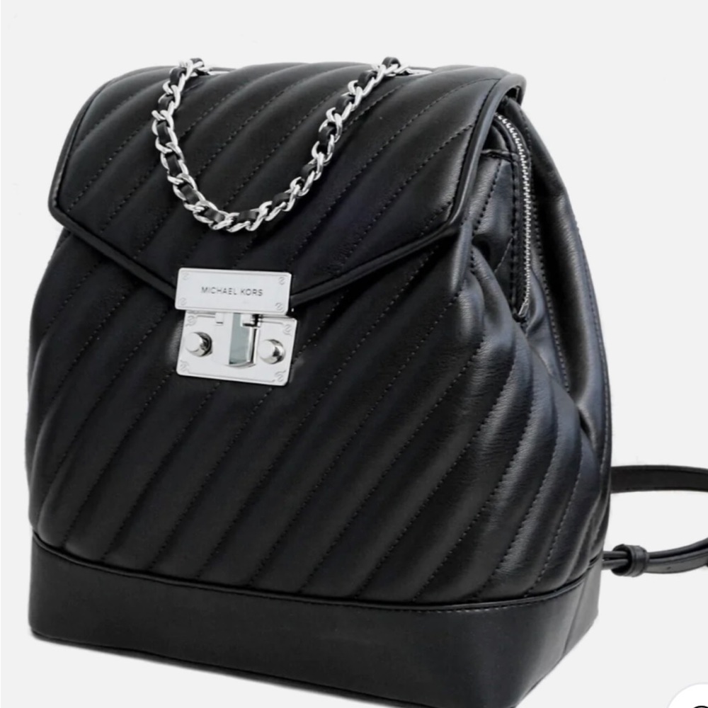MICHAEL KORS Rose Medium Chain Backpack Purse
MSRP $628.00